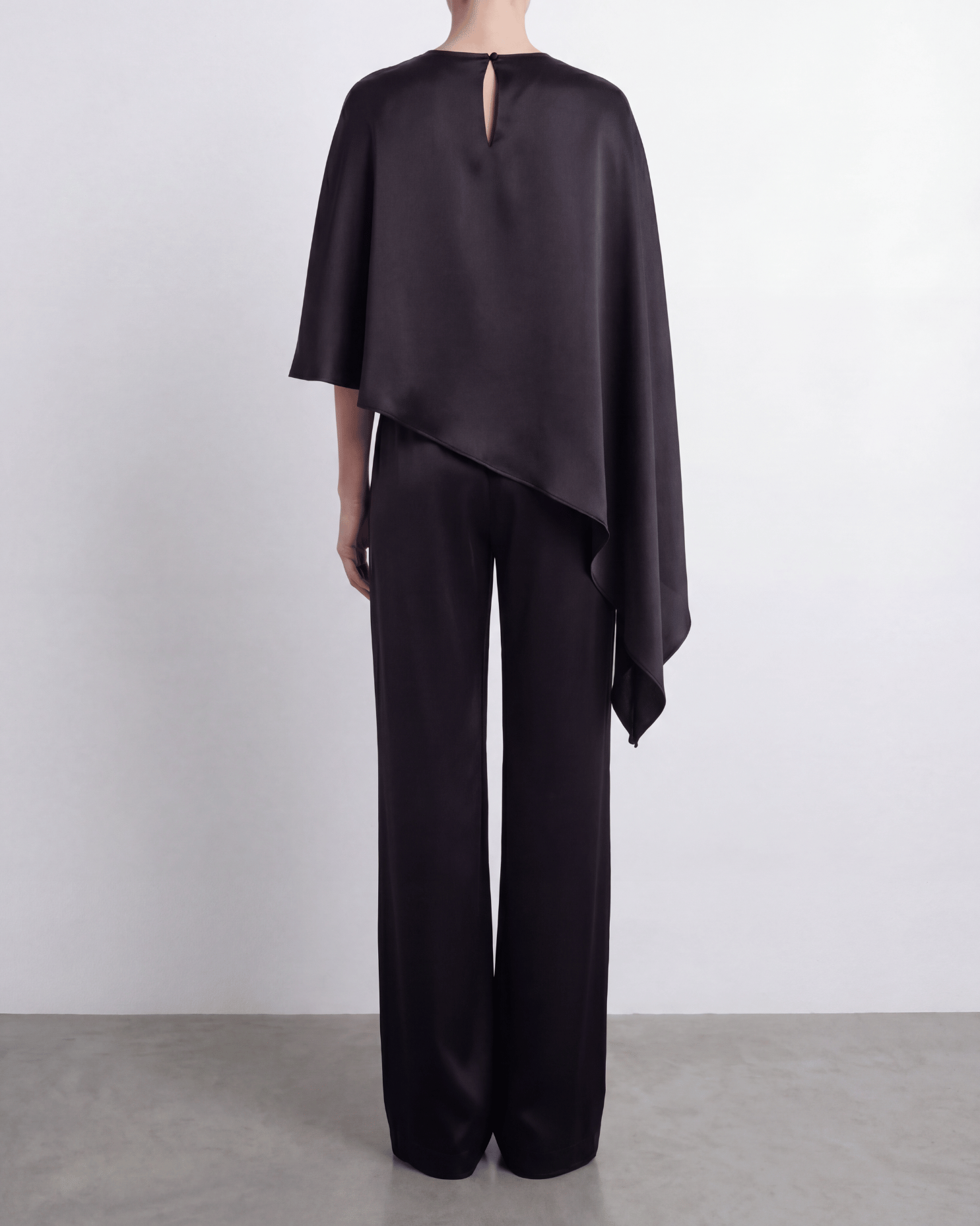 The Asymmetric Cape Top